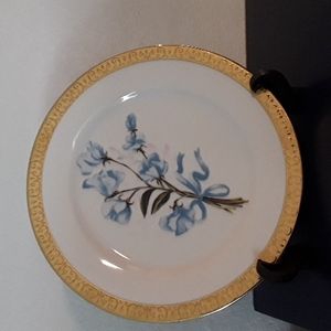 Royal Gallery decorative plate with blue flowers.